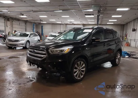 2017 Ford Escape Titanium z USA, uszkodzony, nr VIN 1FMCU9JD9HUC40929